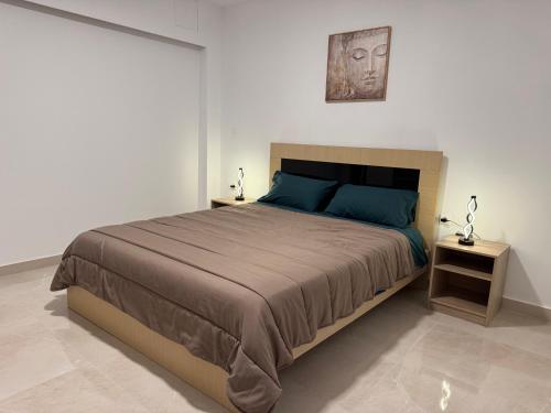 Ένα ή περισσότερα κρεβάτια σε δωμάτιο στο Hermes Apartment - Athens Int Airport