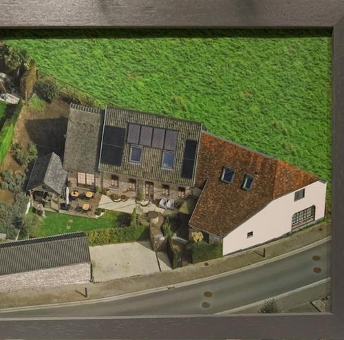 an aerial view of a house with a yard at Casa della Nonna in Zwalm