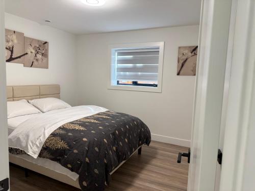 Ένα ή περισσότερα κρεβάτια σε δωμάτιο στο Calm & Cozy Private Suite