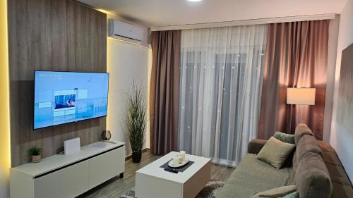 TV a/nebo společenská místnost v ubytování Silver Dream 2
