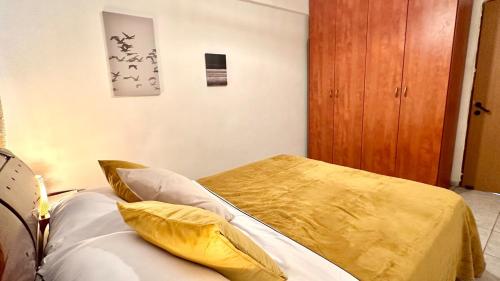 Postel nebo postele na pokoji v ubytování Truman beach Resort Apartment