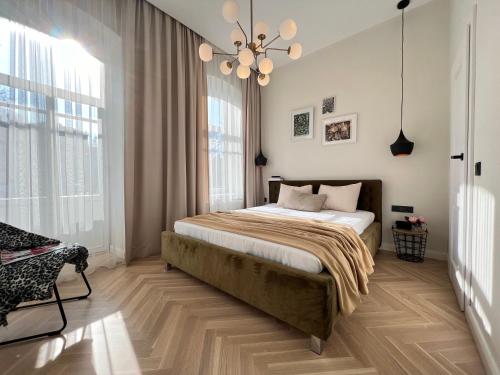 Postel nebo postele na pokoji v ubytování City central apartment