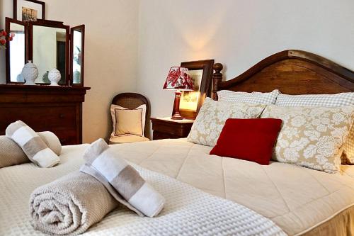 Postel nebo postele na pokoji v ubytování A Casa dos Raminhos
