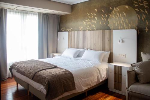 Postel nebo postele na pokoji v ubytování Hotel Bermeo