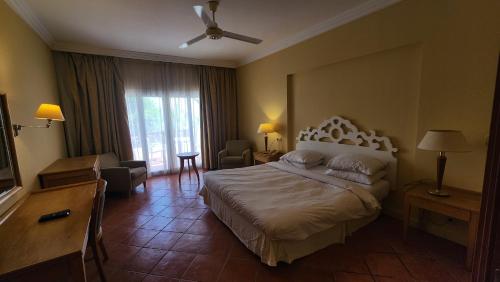 Postel nebo postele na pokoji v ubytování Hotel Suite In Jazz Sharm Dreams
