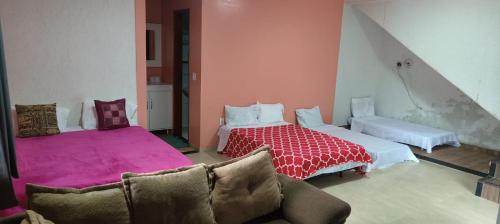 Ένα ή περισσότερα κρεβάτια σε δωμάτιο στο Baixo Sana pousada