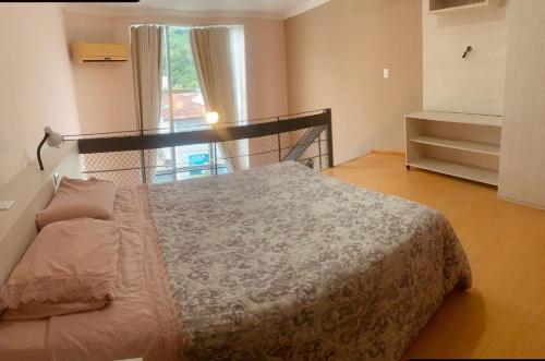 Postel nebo postele na pokoji v ubytování Saint Sebastian ap202-flat com hidro, ate 4pessoa!