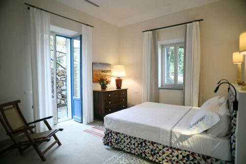 Postel nebo postele na pokoji v ubytování Villa Gallini