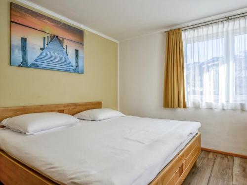 Postel nebo postele na pokoji v ubytování Chalet Staffner