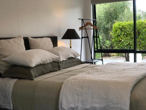 Postel nebo postele na pokoji v ubytování Villetta - Matakana Country Escape