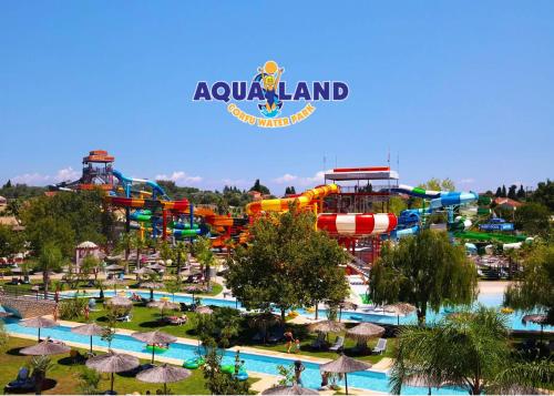 an image of a water park with a roller coaster at Carmen's 1st floor Apartment with floor Sea View and roof terrace- Lakones in Lákones
