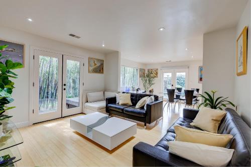 a living room with a couch and a table at Urban Oasis next to Santana Row in San Jose