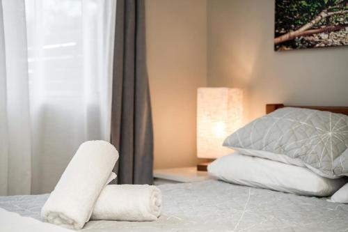 Ένα ή περισσότερα κρεβάτια σε δωμάτιο στο Absolute Beachfront Apartment 8B