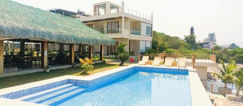 Фотография из галереи Summer Coastal Suites в городе Bacnotan