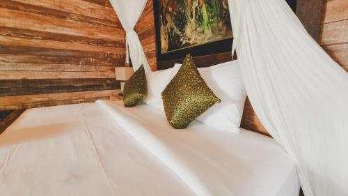 Postel nebo postele na pokoji v ubytování Aura Guesthouse
