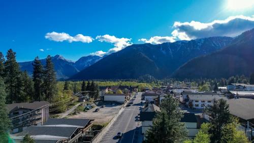 an aerial view of a town with mountains in the background at Snowcreek Suite - Cedar - ADA- Hot Tub - Kitchenette in Leavenworth