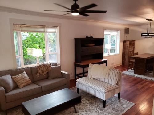 a living room with a couch and a table at Snowcreek Suite - Ponderosa in Leavenworth