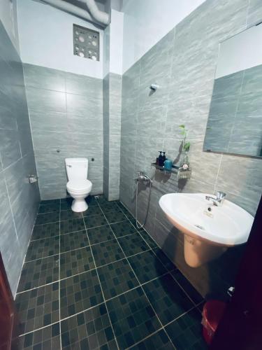 Ванная комната в Cối Xay Gió Homestay Quảng Bình