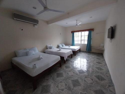 Ένα ή περισσότερα κρεβάτια σε δωμάτιο στο Hotel María José
