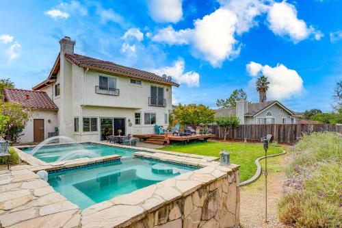 a backyard with a swimming pool and a house at Wine Country Gateway with Views Btwn Napa and SF in Vallejo