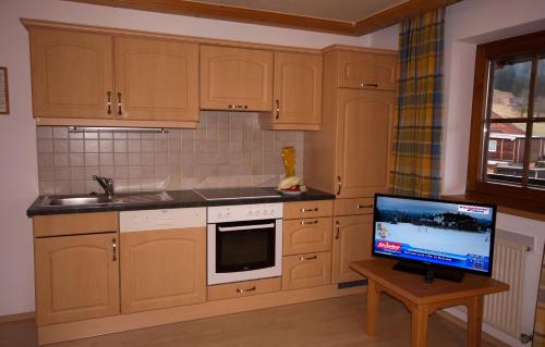 Η κουζίνα ή μικρή κουζίνα στο Activ Wellness - Appartement Schermerhof