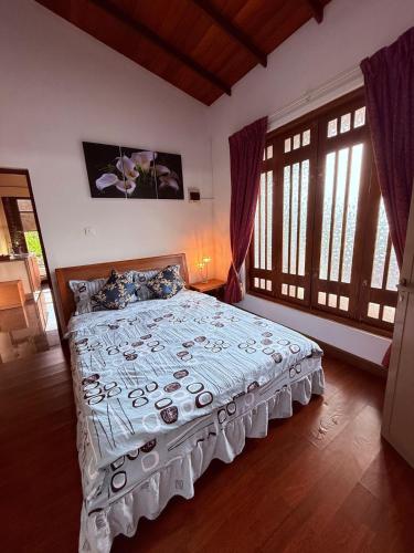 Postel nebo postele na pokoji v ubytování Resident View Homestay