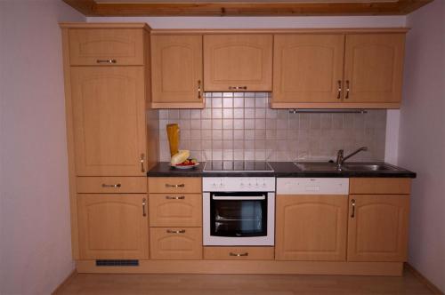 Η κουζίνα ή μικρή κουζίνα στο Activ Wellness - Appartement Schermerhof
