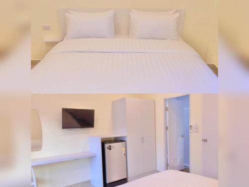 a room with a bed and a room with a tv at Thai Orchid Guest House in Jomtien Beach