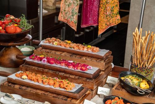 a group of food items on display on a table at Park Hyatt Shenzhen in Shenzhen