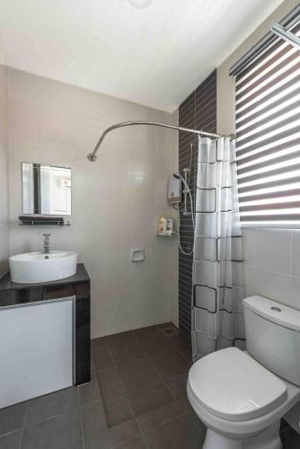 a bathroom with a toilet and a sink and a shower at Baydream Villa - NEW Private Pool in Langkawi Islands