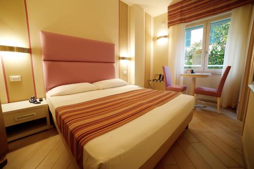 Katil atau katil-katil dalam bilik di Hotel Souvenir