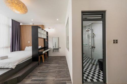 Ένα ή περισσότερα κρεβάτια σε δωμάτιο στο Lala House Dalat