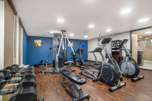 a gym with a bunch of exercise bikes in it at Comfort Inn Charlotte Airport Uptown in Charlotte