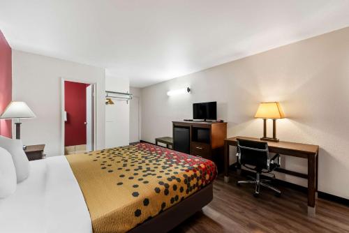 Ένα ή περισσότερα κρεβάτια σε δωμάτιο στο Econo Lodge Fallon Naval Air Station Area