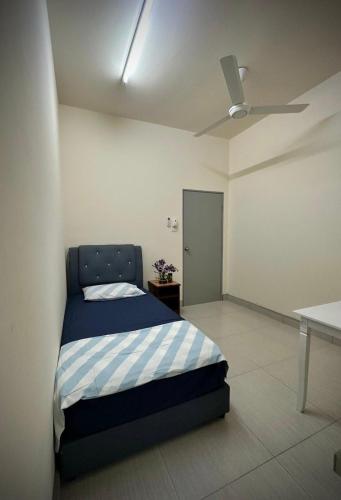 Postel nebo postele na pokoji v ubytování Homestay Adyana