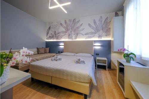 Postel nebo postele na pokoji v ubytování Villa Mimosa