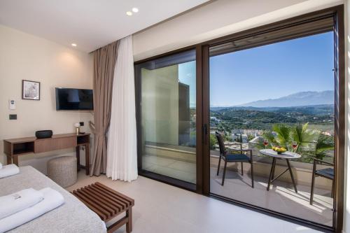 a hotel room with a view of a room at Almi-Cove Hilltop Villas in Almirida