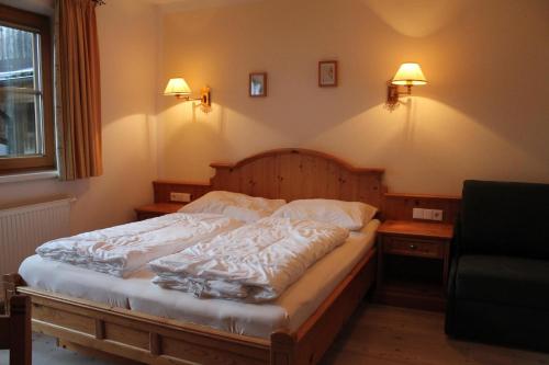 Postel nebo postele na pokoji v ubytování Appartements Innerache