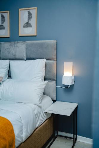 Katil atau katil-katil dalam bilik di Zuriya Apartments