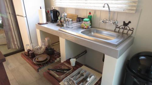 Kuchyň nebo kuchyňský kout v ubytování Parksig Self Catering