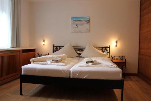 Ένα ή περισσότερα κρεβάτια σε δωμάτιο στο Haus Heidi Top 6 by Alpenfeder