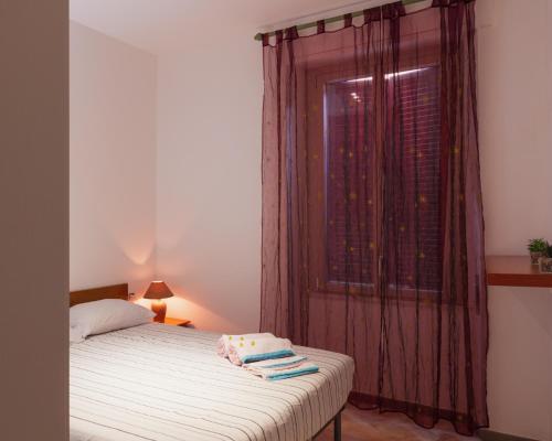 Letto o letti in una camera di Domàtio Melissa Summer