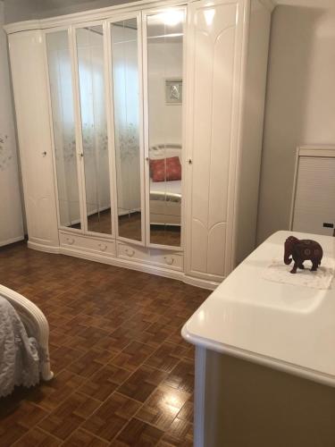 Ένα ή περισσότερα κρεβάτια σε δωμάτιο στο san pietro apartmento piccolo ranch