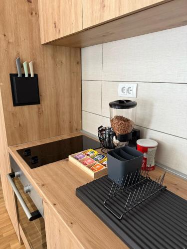 Una cocina o zona de cocina en Royal apartmani Vrnjačka Banja
