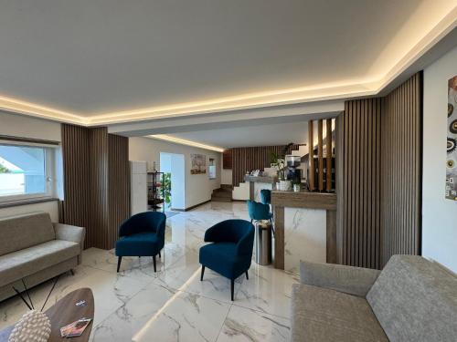 Posezení v ubytování Hotel Cocceio