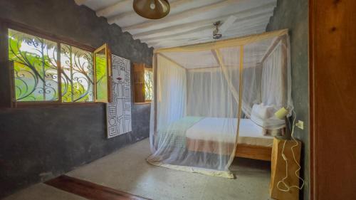 Ένα ή περισσότερα κρεβάτια σε δωμάτιο στο Bila Beach House