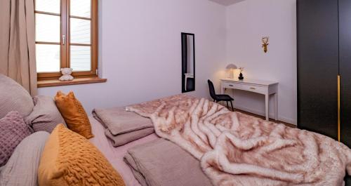 Postel nebo postele na pokoji v ubytování Apartment 2 Weide Zanthierhaus