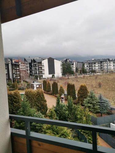 a view of a city from a balcony at Pirin Views Aspen A337 in Razlog