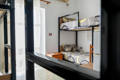 Brothers Of The World Hostelにあるベッド