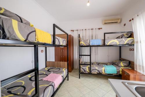 Brothers Of The World Hostelにあるベッド